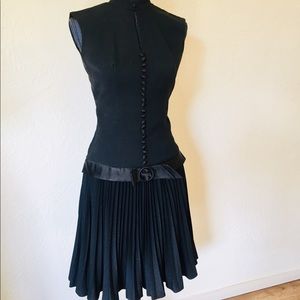 Black dress vintage.  Pleated perfect condition.
